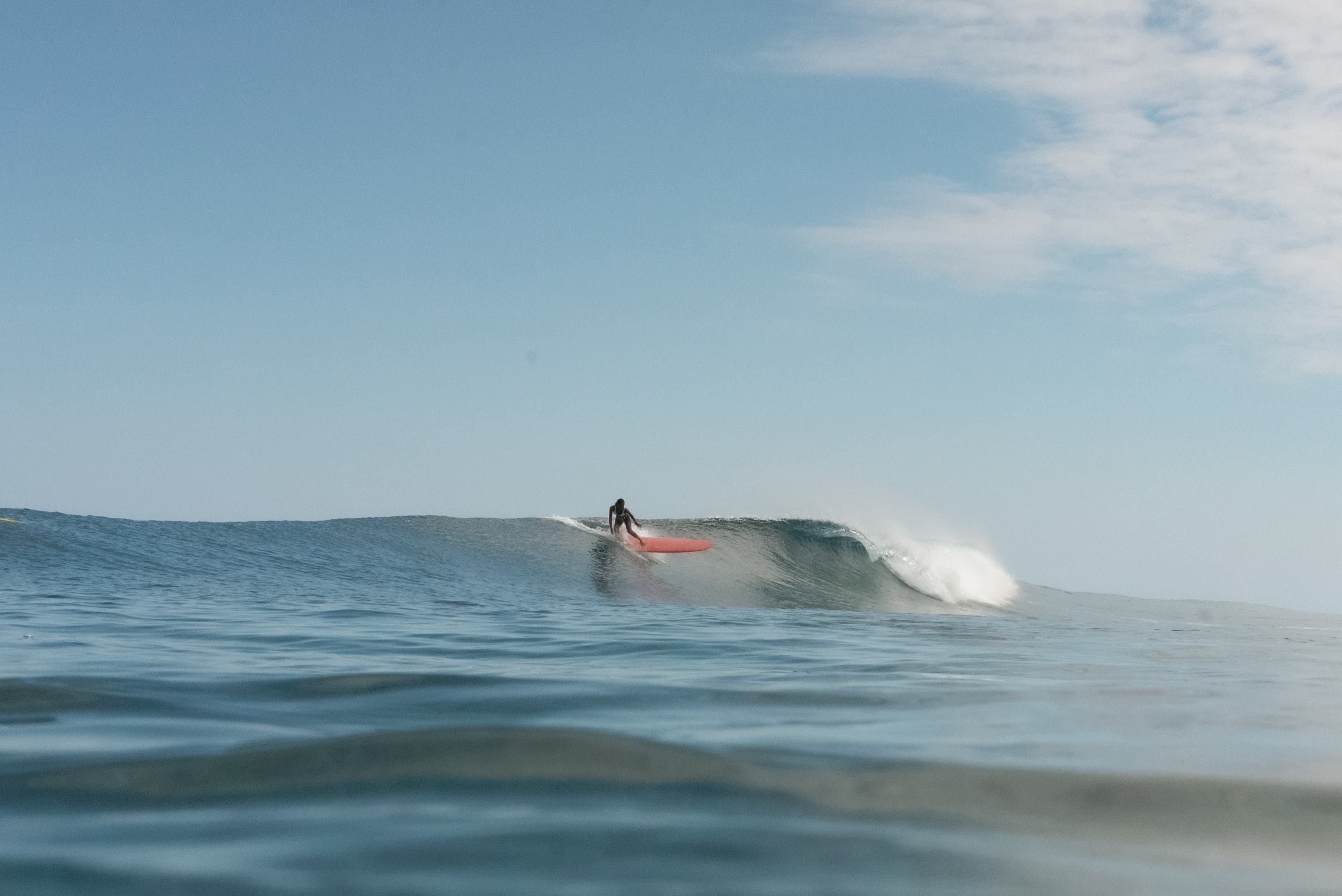 Ikit Agudo surfing at Cemetery Right Siargao Island big waves Philippines
