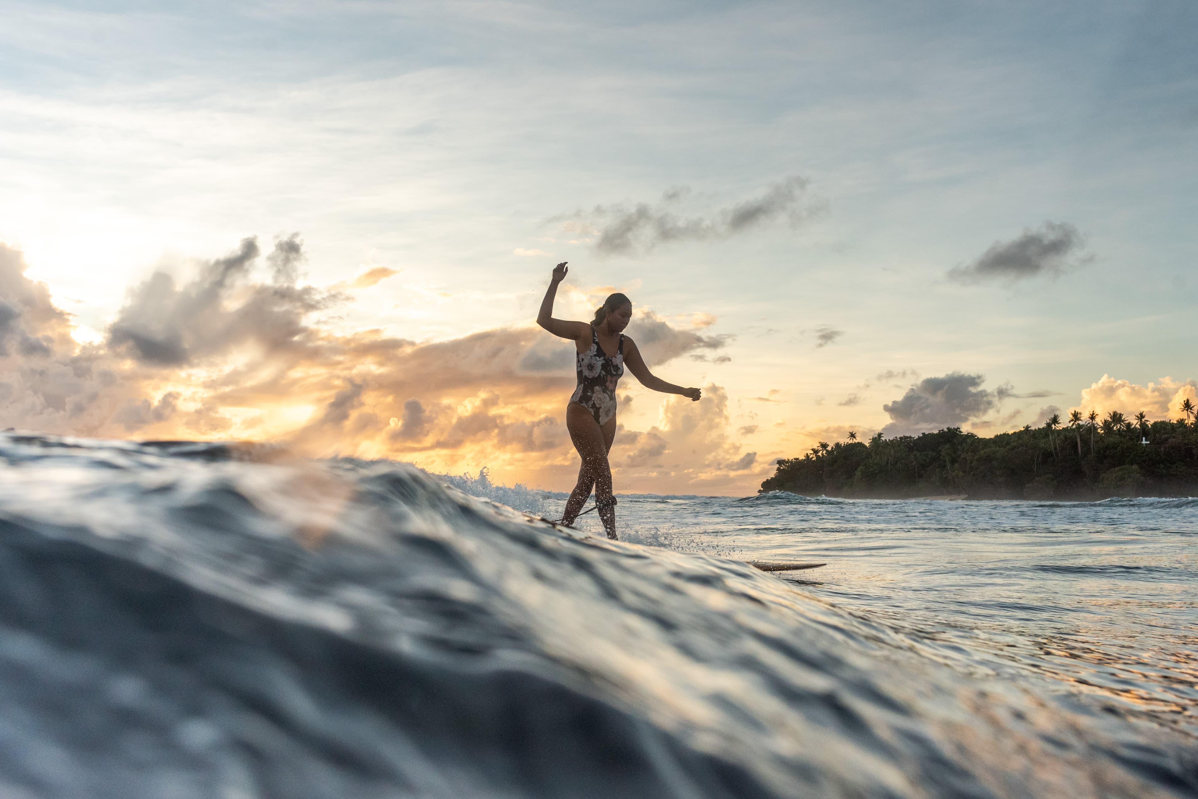 Local surfer with a beautiful view of Cloud 9